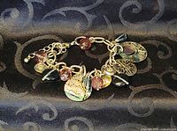 Bracelet laid flat showing all charms