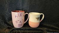Front view of both mugs side by side