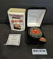 Full lot with signed puck in display case, COA, pin, cardboard sleeve