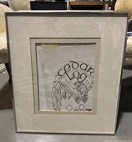 Front view of framed print showing illustration, double mat and silver frame