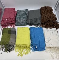 All eight scarves laid out for overview