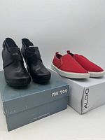 Both pairs of footwear on original boxes
