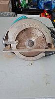 Front view showing Makita blade guard and installed blade