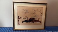 Front view of framed lithograph under glass
