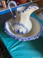 Pitcher seated in matching basin showing overall form and color