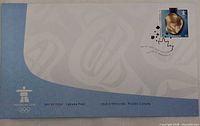 Front of First Day Cover showing stamp, logo, postmark