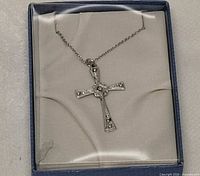Necklace displayed in presentation box showing pendant and chain
