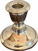 Front angled view of sterling silver candle holder