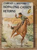 Front cover of Hopalong Cassidy Returns hardcover with dust jacket