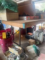 Full view of folding work table with items on top