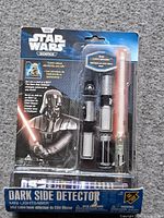 Front of sealed Star Wars Science Dark Side Detector Mini Lightsaber package
