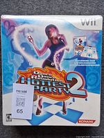 Front of sealed DDR Hottest Party 2 Wii bundle package
