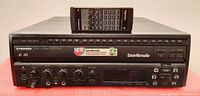Front view of Pioneer CLD-V720 with remote on top