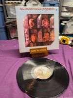 Front sleeve artwork on display stand