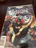 Front cover of Batgirl #11 comic in sleeve