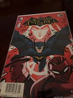 Front cover of Batman #1 comic in protective bag