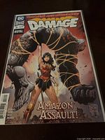 Front cover of Damage #3 comic, bagged and boarded