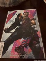 Front view of Deathstroke #38 comic in bag and board