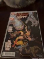 Front view of bagged Justice League Dark #27 comic showing entire cover art