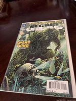 Front view of Secret Origins #9 comic in sleeve