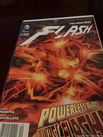 Front cover of The Flash #20 in bag and board