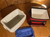 Open view of both coolers showing interiors and detachable lid