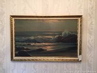 Framed Robert Wood print depicting seascape with waves crashing, signed at lower right.