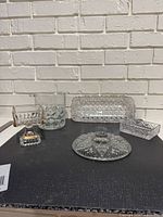 overview of all five pressed glass pieces
