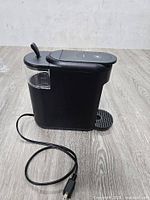 Side view of Keurig K-Mini with power cord attached