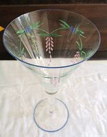 Top view showing blue rim and painted garland inside bowl