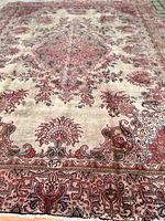 Full view showing entire Persian carpet and pattern