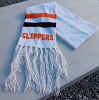 Full view of scarf showing stripes, team name, and tassels