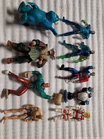All 11 action figures laid out for overview