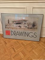 Full view of framed poster showing image, text, frame, and mat