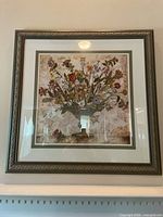 Front view of framed floral print showing artwork, matting and frame detail