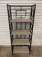 Front view of full bookshelf showing all shelves and frame
