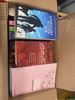 Top of box showing Goodnight Mister Tom, Othello, Little Women and other spines