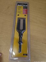 Front of packaged Titan ball joint separator showing fork and specifications