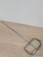 Full view of mixer paddle showing shaft and rectangular head