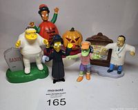 Front view of all six Burger King Simpsons Halloween figures