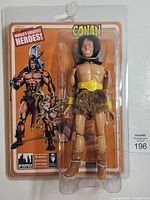 Front view of sealed Conan figure on card