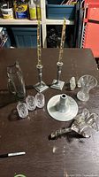 Group shot showing all glass and metal items on table
