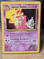 Front of Sabrina's Slowbro card displaying artwork, stats, set symbol and number