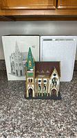 Porcelain church with original box and styrofoam packaging shown together