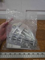 Entire sealed bag showing lock assembly components