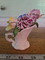 Front view of Radnor bone china pitcher with floral arrangement