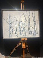 Full frontal view of framed acrylic painting on easel