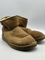 Front angled view of both boots