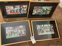 Front view of all four framed panels showing painted scenes