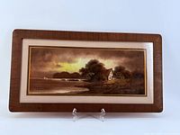 Front view of framed pastel landscape artwork